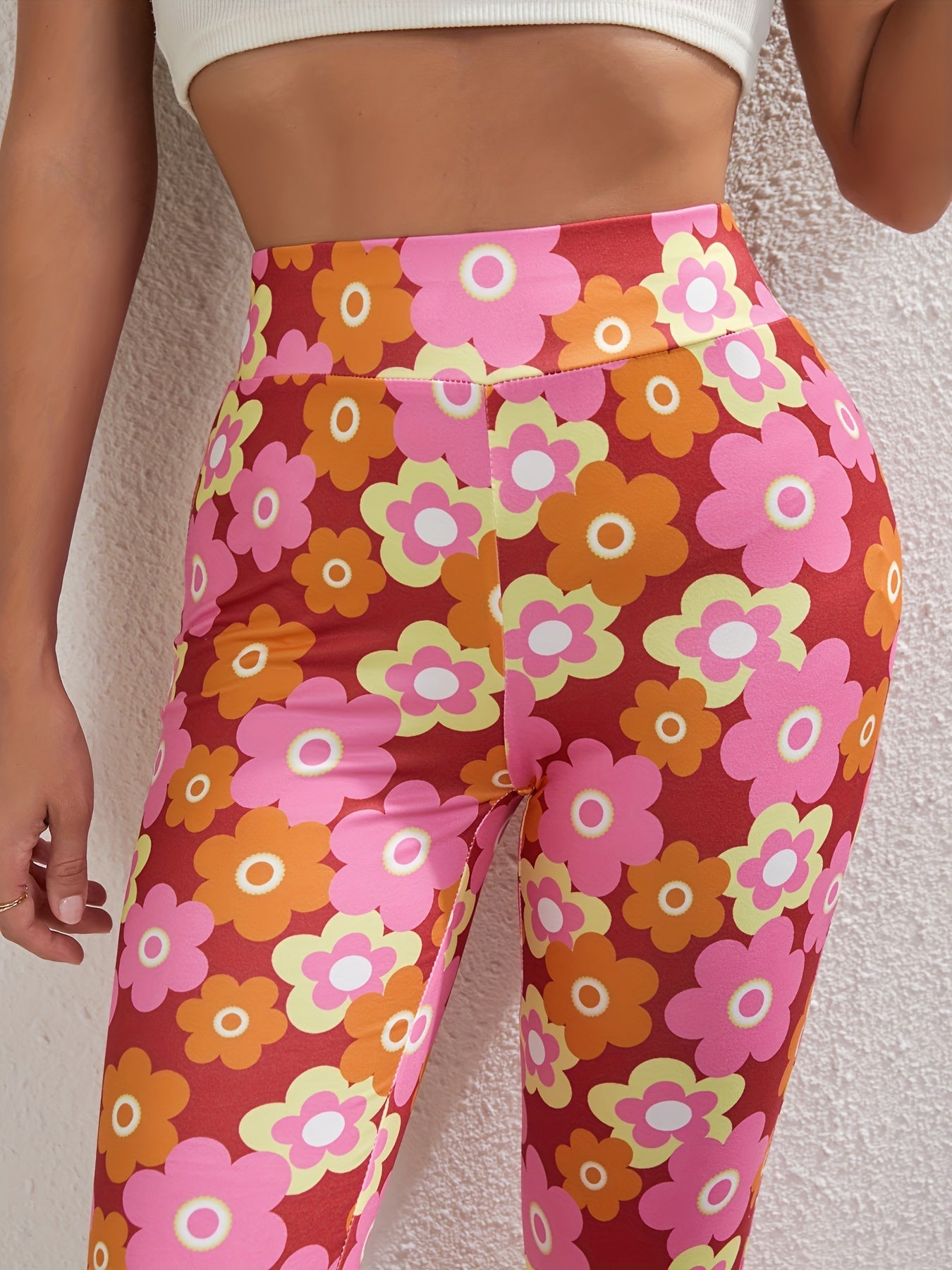 Pantaloni Flared con Fiori Allegri – Eleganti e Traspiranti per Primavera e Estate