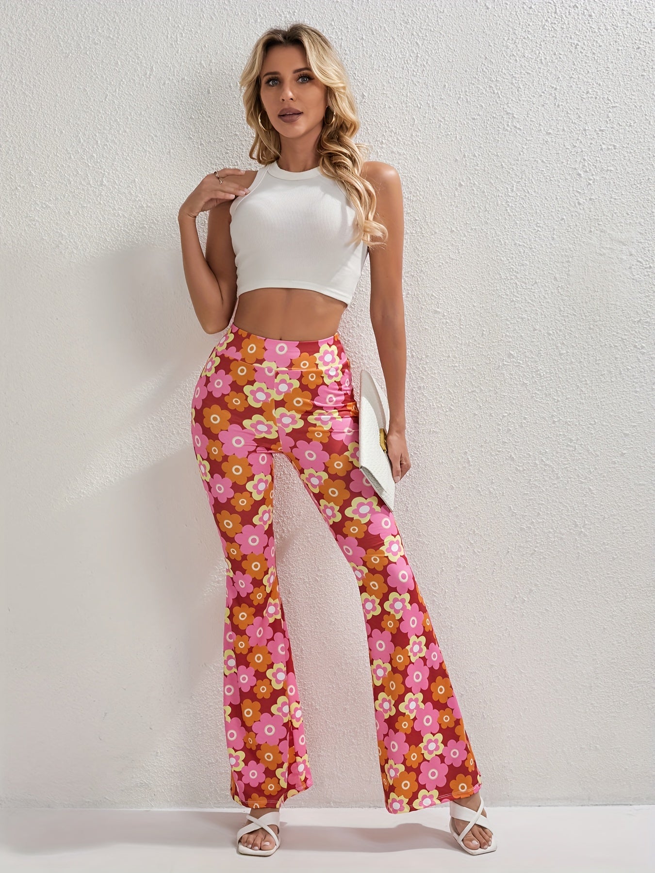 Pantaloni Flared con Fiori Allegri – Eleganti e Traspiranti per Primavera e Estate